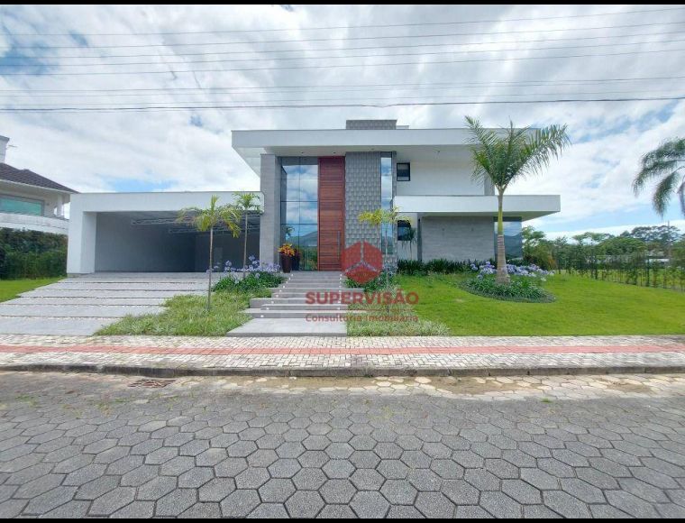 Casa no Bairro Cachoeira do Bom Jesus em Florianópolis com 4 Dormitórios (4 suítes) e 295 m² - CA0895