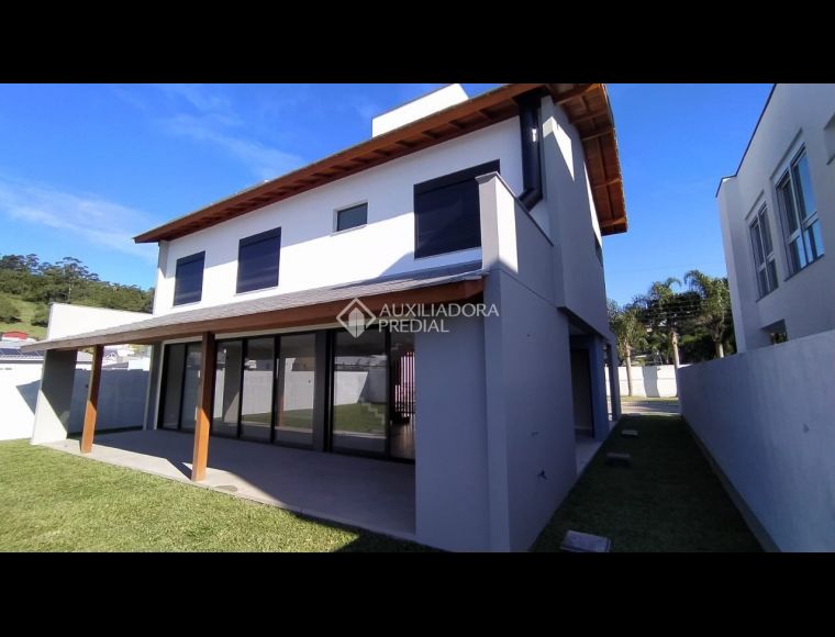 Casa no Bairro Cachoeira do Bom Jesus em Florianópolis com 4 Dormitórios (3 suítes) - 461129