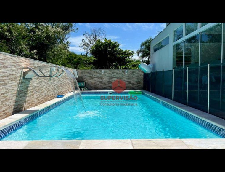 Casa no Bairro Cachoeira do Bom Jesus em Florianópolis com 3 Dormitórios (3 suítes) e 223 m² - CA1089