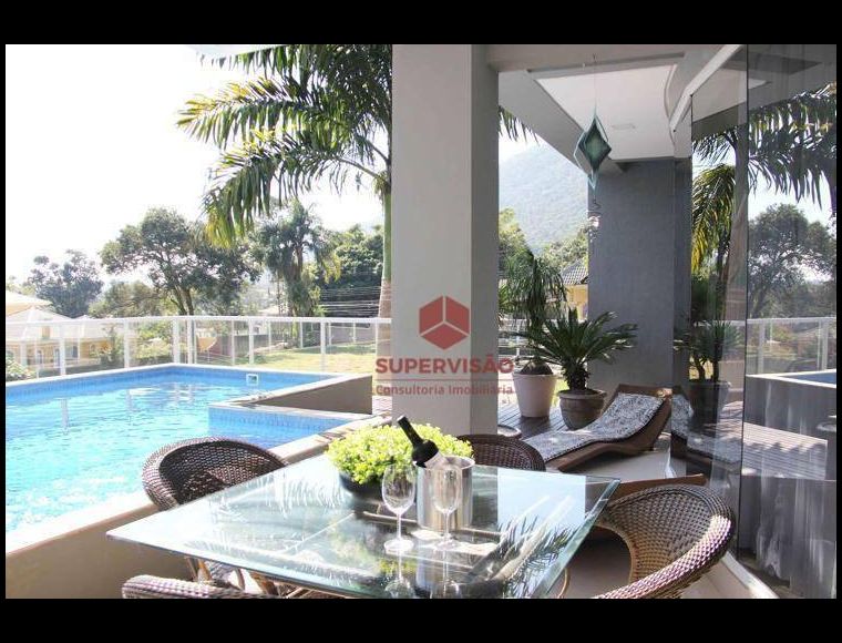 Casa no Bairro Cacupé em Florianópolis com 3 Dormitórios (3 suítes) e 340 m² - CA1120