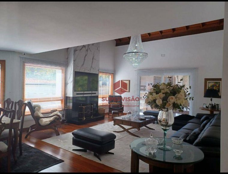 Casa no Bairro Itacorubí em Florianópolis com 4 Dormitórios (3 suítes) e 563 m² - CA0852