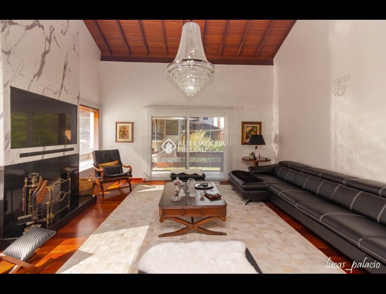 Casa no Bairro Itacorubí em Florianópolis com 4 Dormitórios (3 suítes) - 416489