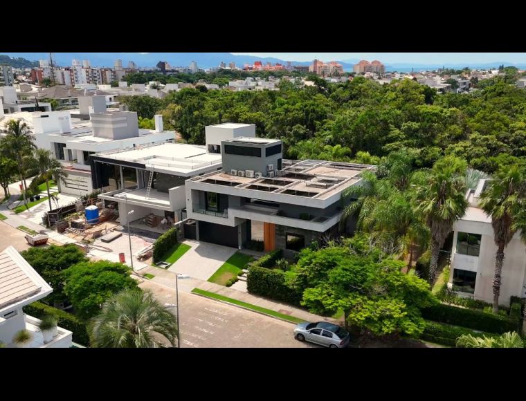 Casa no Bairro Jurerê Internacional em Florianópolis com 4 Dormitórios (4 suítes) e 564 m² - CA0290