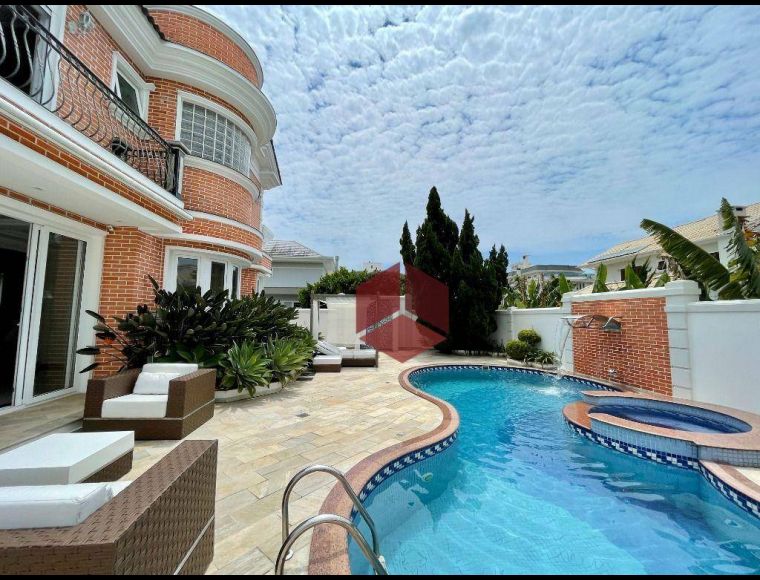 Casa no Bairro Jurerê Internacional em Florianópolis com 4 Dormitórios (4 suítes) e 476 m² - CA0577