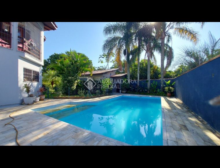 Casa no Bairro Santa Mônica em Florianópolis com 4 Dormitórios (1 suíte) - 378338