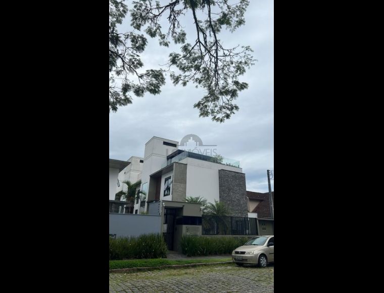 Casa no Bairro América em Joinville com 3 Dormitórios (3 suítes) e 336 m² - LG8692