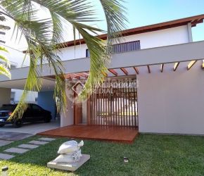 Casa no Bairro Cachoeira do Bom Jesus em Florianópolis com 4 Dormitórios (3 suítes) e 236 m² - 642104
