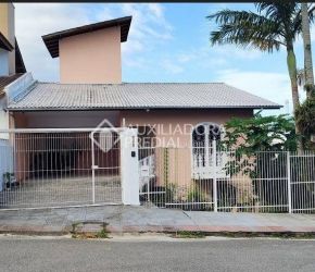 Casa no Bairro Coqueiros em Florianópolis com 4 Dormitórios (1 suíte) - 468194