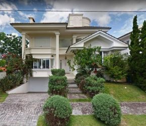 Casa no Bairro Jurerê Internacional em Florianópolis com 4 Dormitórios (3 suítes) e 365 m² - CA0228
