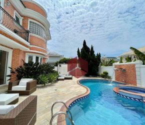 Casa no Bairro Jurerê Internacional em Florianópolis com 4 Dormitórios (4 suítes) e 476 m² - CA0577