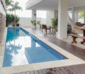 Casa no Bairro Lagoa da Conceição em Florianópolis com 4 Dormitórios (4 suítes) - 458300