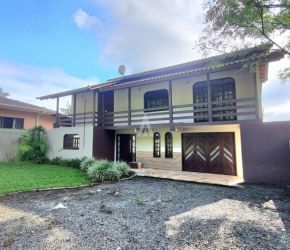 Casa no Bairro Comasa em Joinville com 4 Dormitórios (1 suíte) e 180 m² - 07872.001