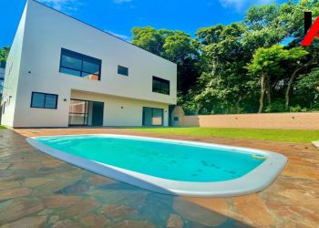 Casa no Bairro Itacorubí em Florianópolis com 4 Dormitórios (4 suítes) - CA00263V